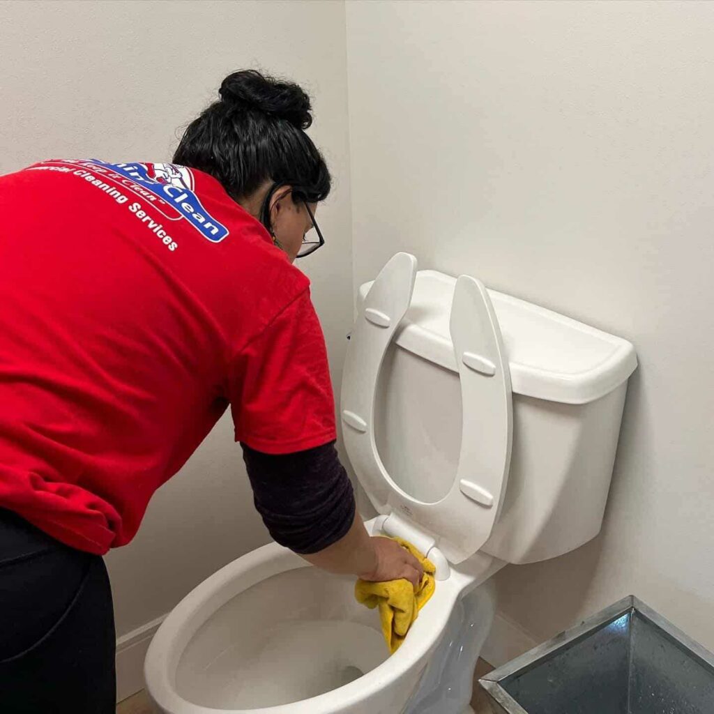 professional cleaner clean the toilet Dura-Shine Clean