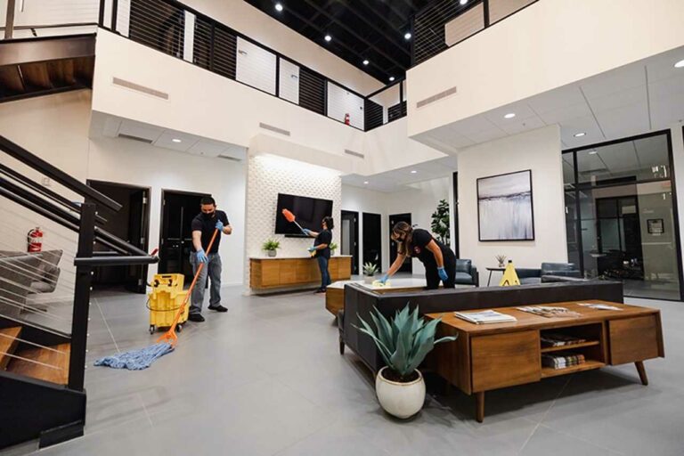 professional cleaners performing janitorial services tasks Dura-Shine Clean
