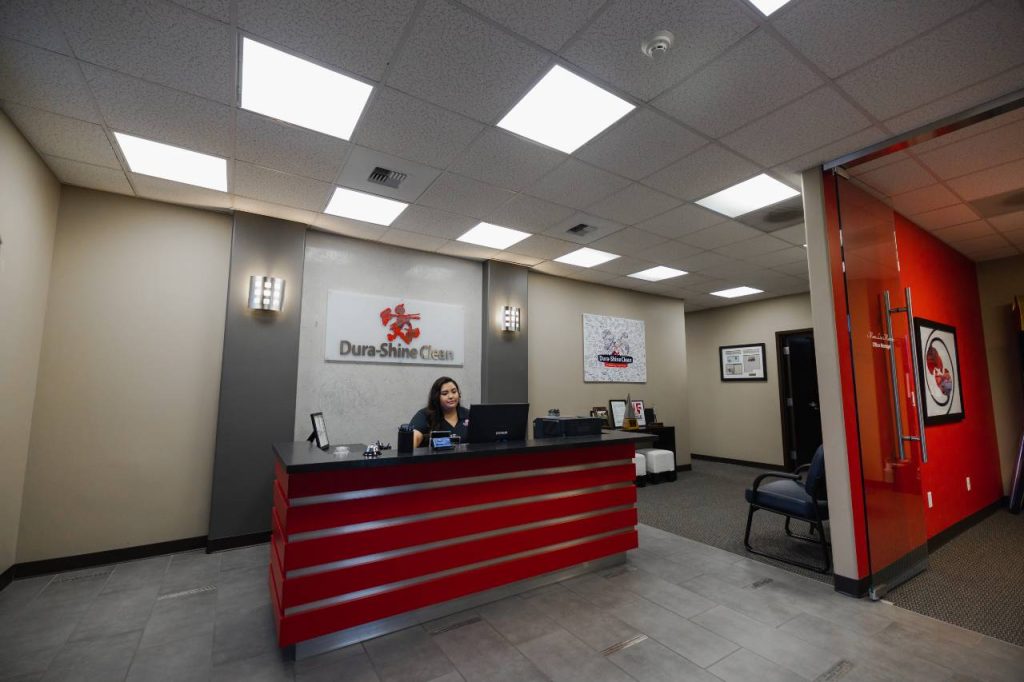 employee seated in the reception area